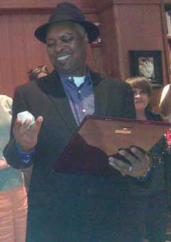 Dr. Booker T. Jones received an SAI Craftsmanship Award plaque and a native Indiana geode.