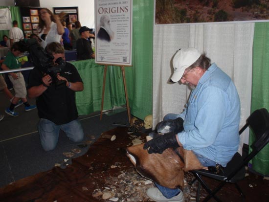 Nick Toth demonstrates flintknapping at Celebrate Science Indiana 2013